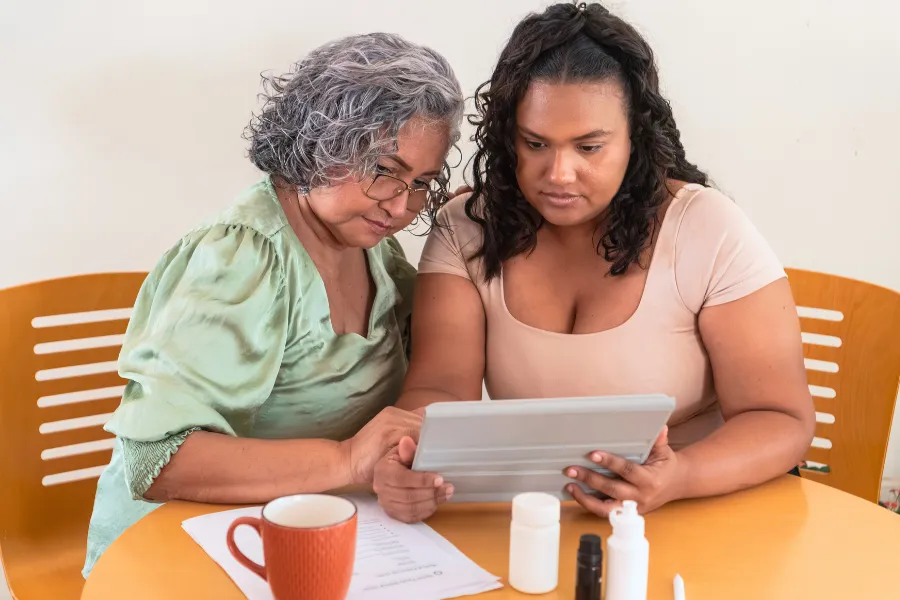 Two woman looking at ipad